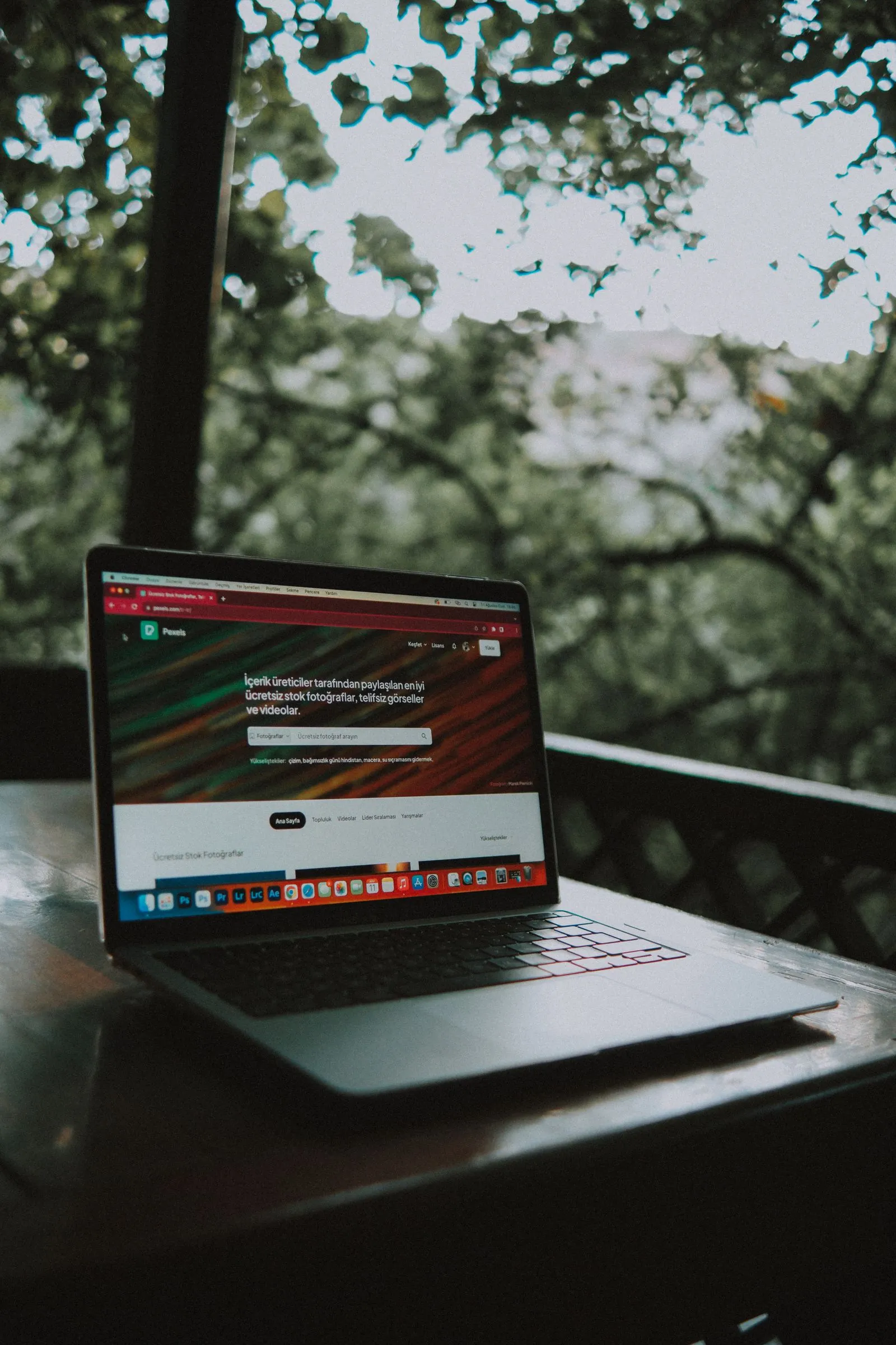 Laptop showing a company website — the source of truth for what a company is actually hiring for