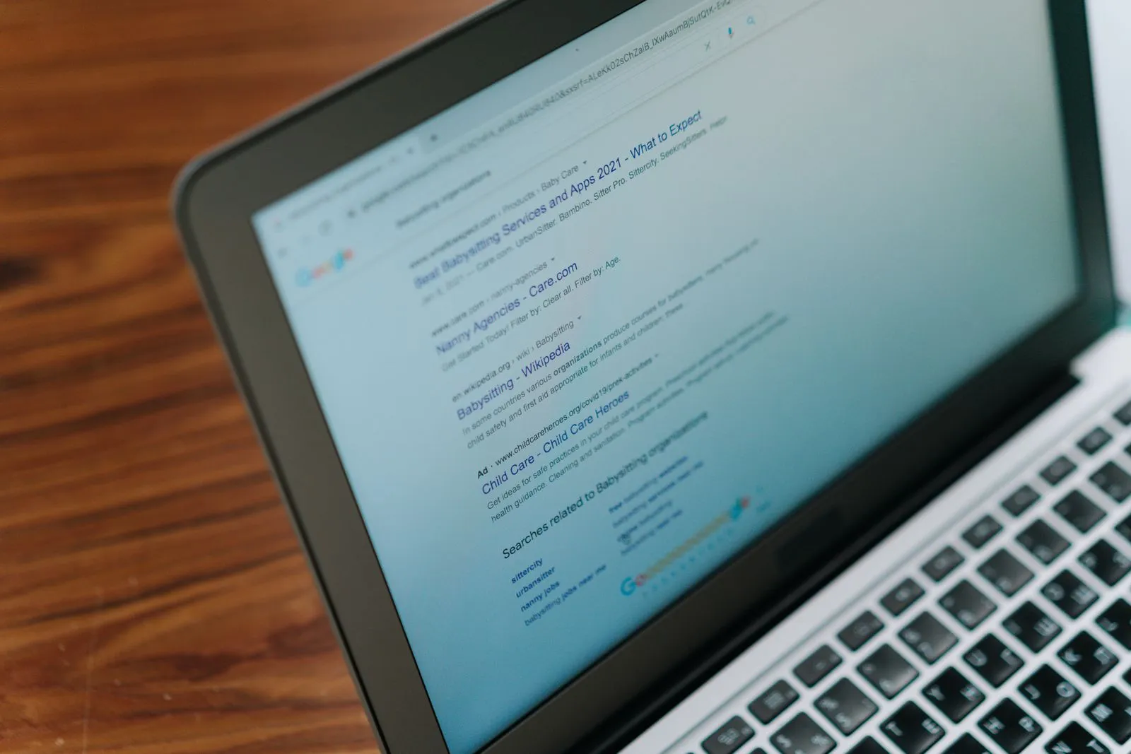 Laptop showing a search engine page — search operators turn Google into a source-level job search